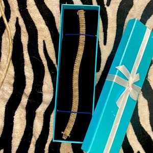 14 ct gold over sterling silver, diamond tennis bracelet.